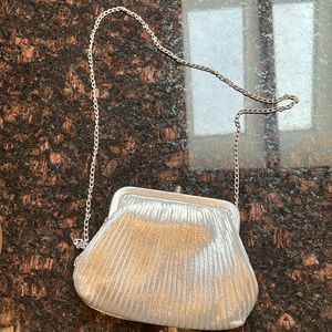 Small silver shiny evening bag in perfect condition